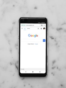 Phone with Google open.