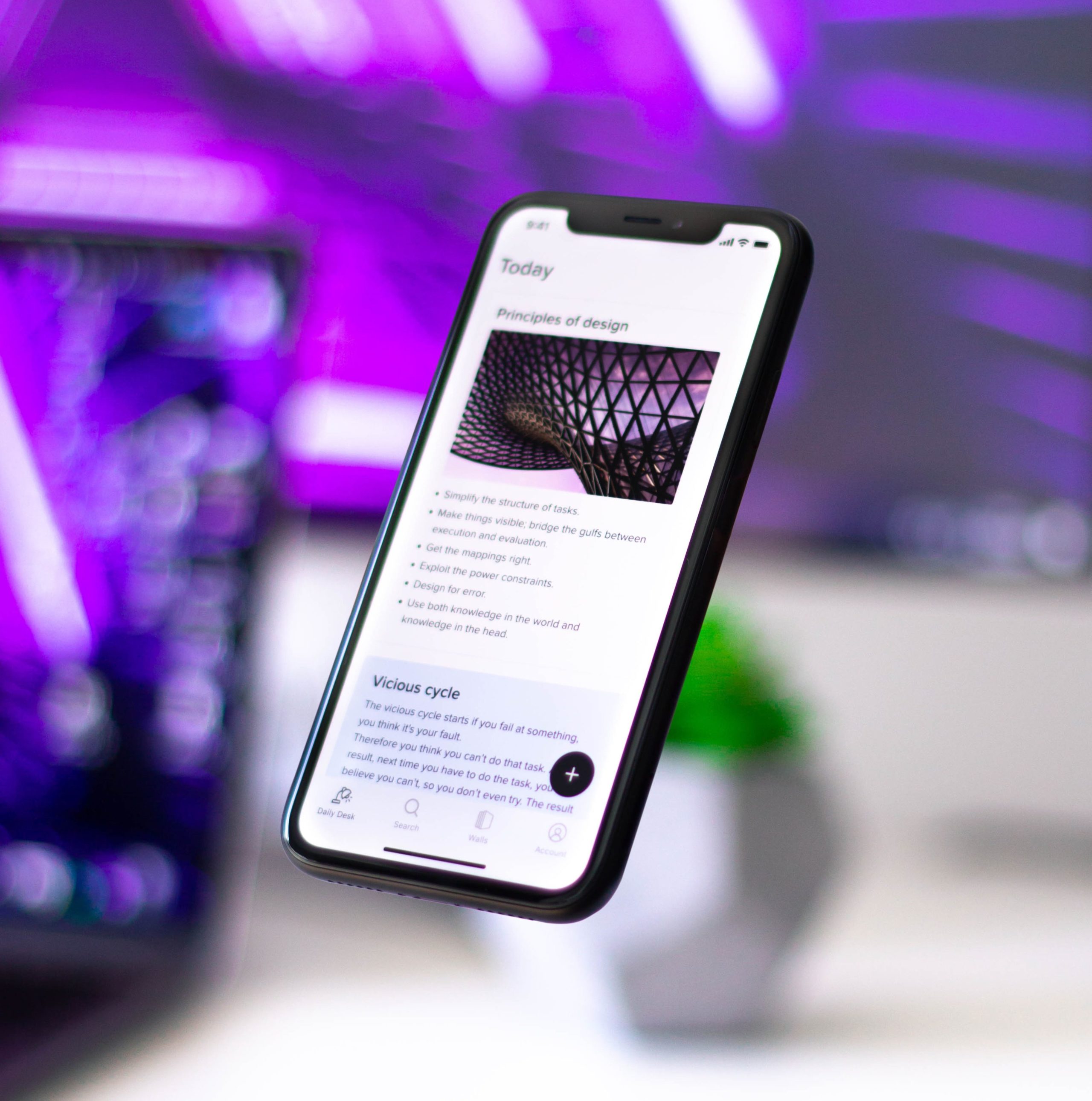 Floating phone with a website open.